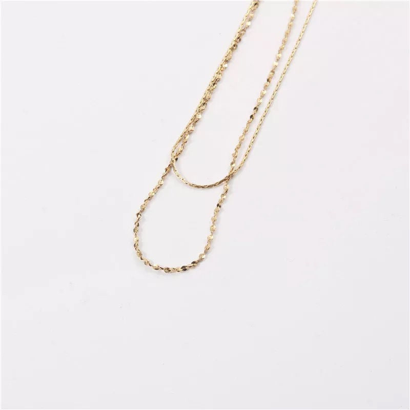 Raising Surfers- The Lennon Necklace